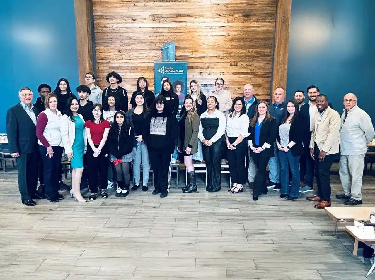 Stevenson with Junior Achievement staff and community partners during a recognition moment