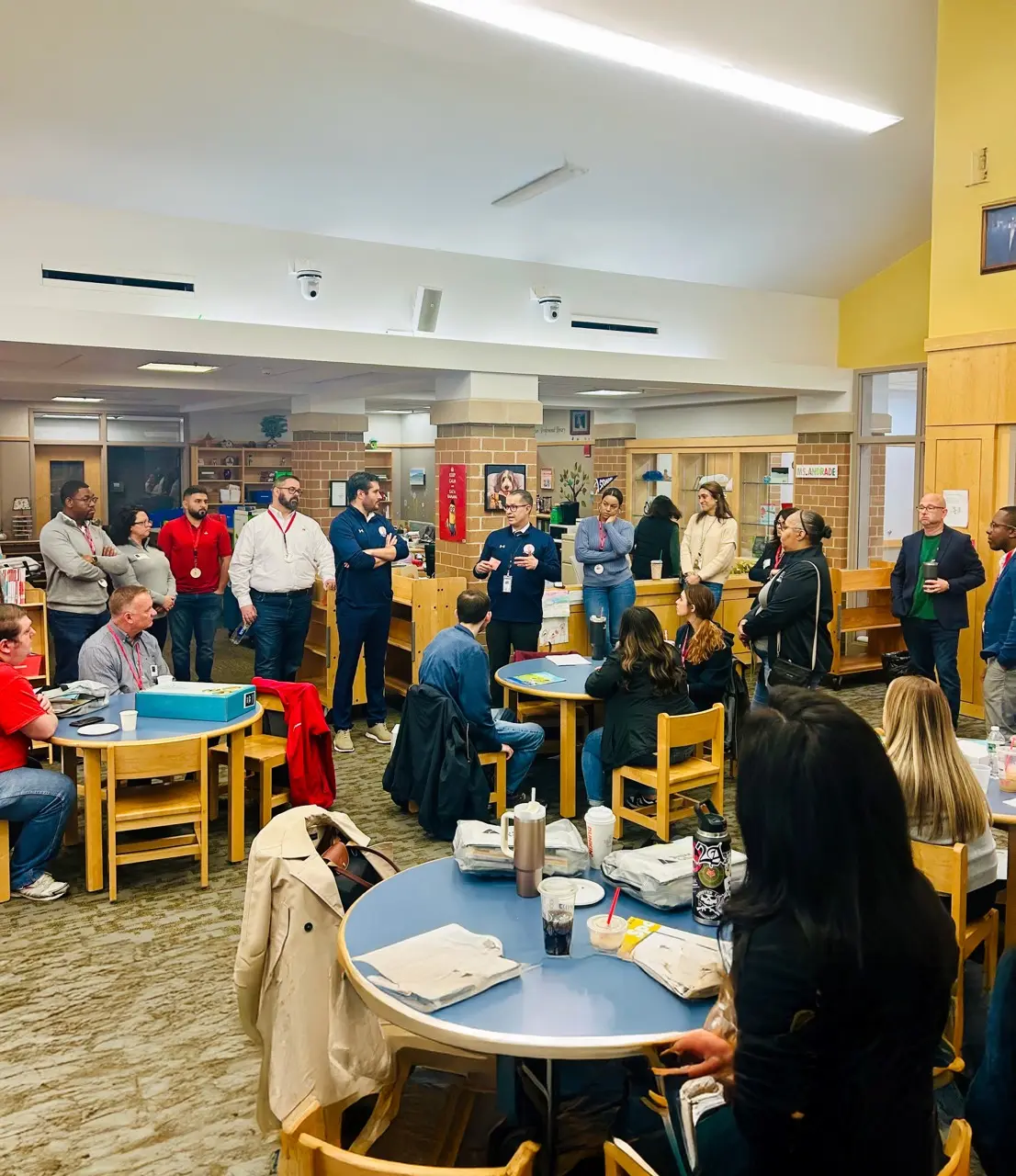 Community leader speaking during a Junior Achievement school event